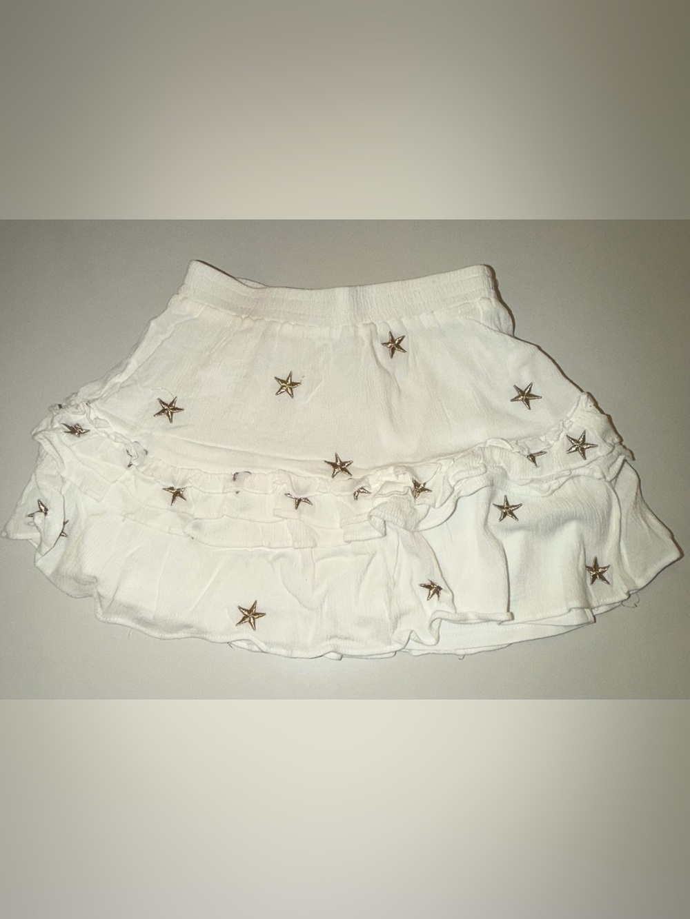 Storia White Ruffle Skater Skirt with Gold Star Details